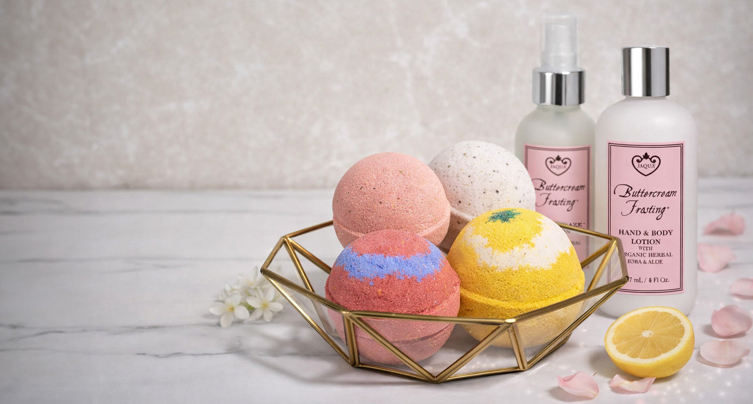 Jaqua 4-piece bath bombs variety gift set on vanity with body glaze and body lotion bottles.